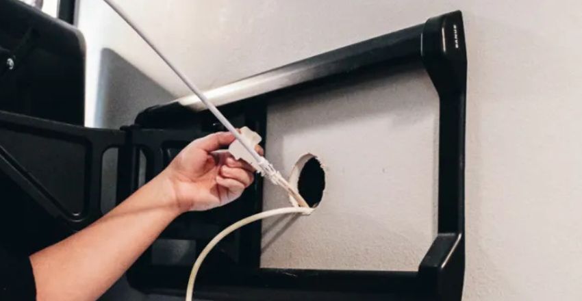 Professional installation of hidden TV wires